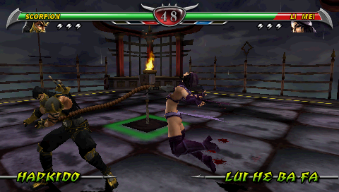 Mortal Kombat: Unchained PSP Scorpion pulling Li Mei.
