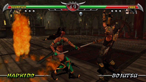 Mortal Kombat: Unchained PSP Jade poking Scorpion.