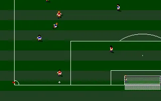 Sensible Soccer: European Champions Atari ST One players tries a sliding tackle and misses the ball with 15 meters