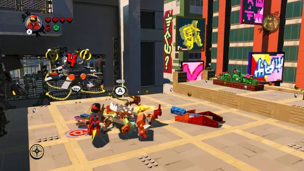 The LEGO Ninjago Movie Video Game Nintendo Switch Building LEGO objects.