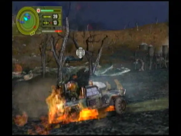 Reign of Fire GameCube A flaming jeep makes it out of a forest.