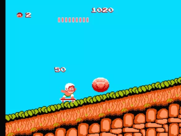 Adventure Island NES Pay attention... a boulder!!