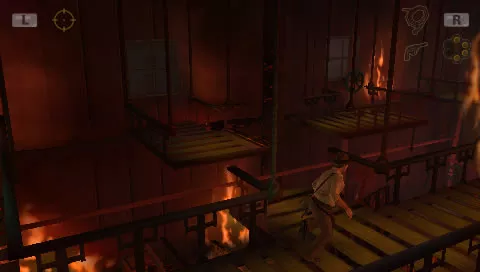 Indiana Jones and the Staff of Kings PSP Escaping from a warehouse on fire.