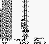The Flintstones: King Rock Treasure Island Game Boy Using the lift.